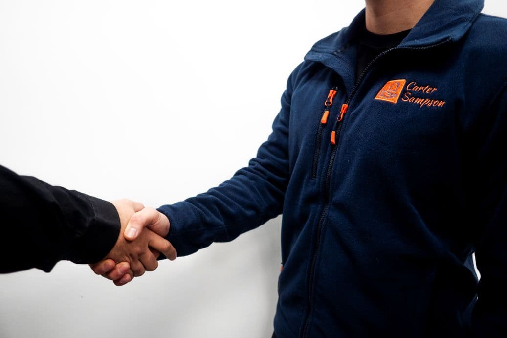 Professional handshake representing strong relationships
